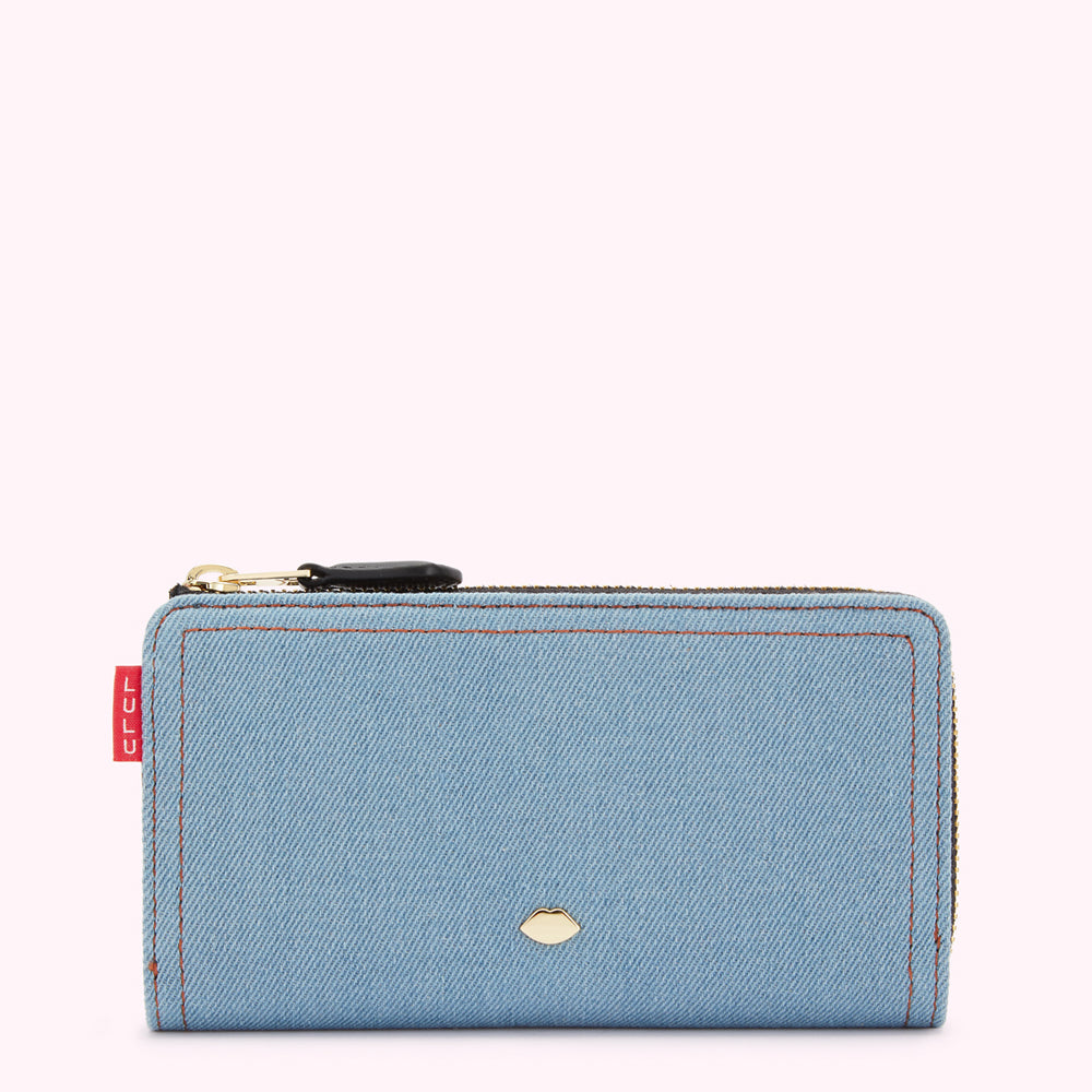 Light blue denim zip-around wallet with gold zipper and small gold logo.