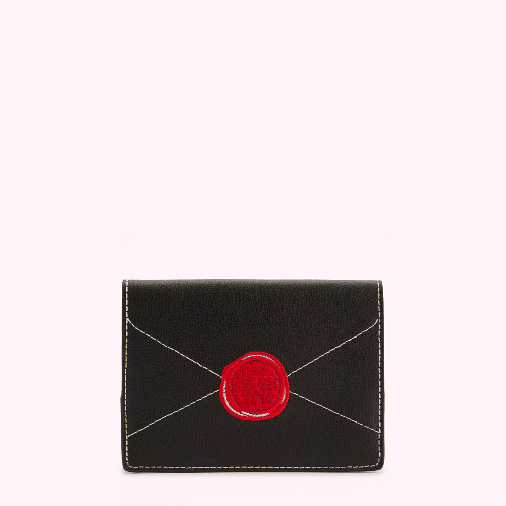 Black leather envelope-shaped cardholder with a red wax seal emblem.
