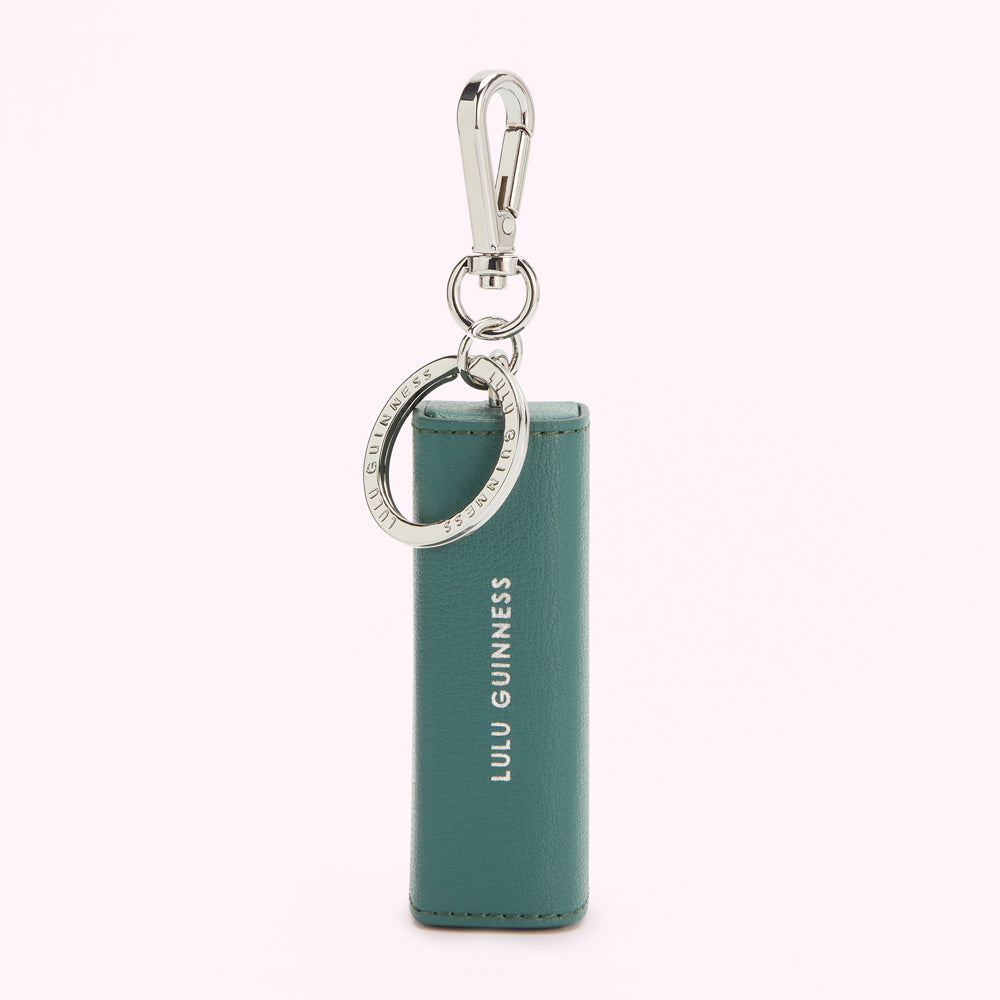 Teal Lulu Guinness lipstick keychain with silver clasp and engraved keyring.
