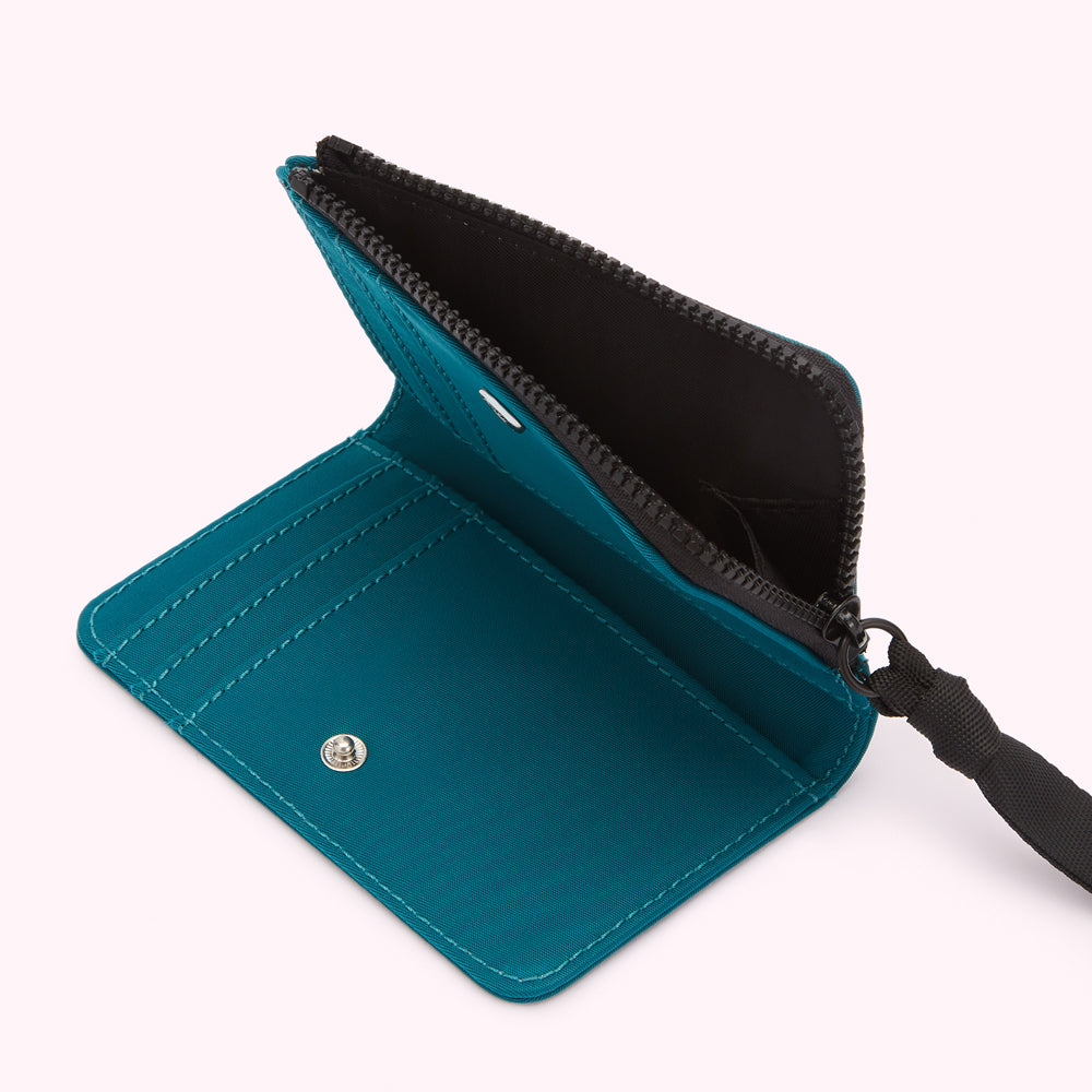 Teal zipper wallet open to reveal interior card slots and a black zipper.
