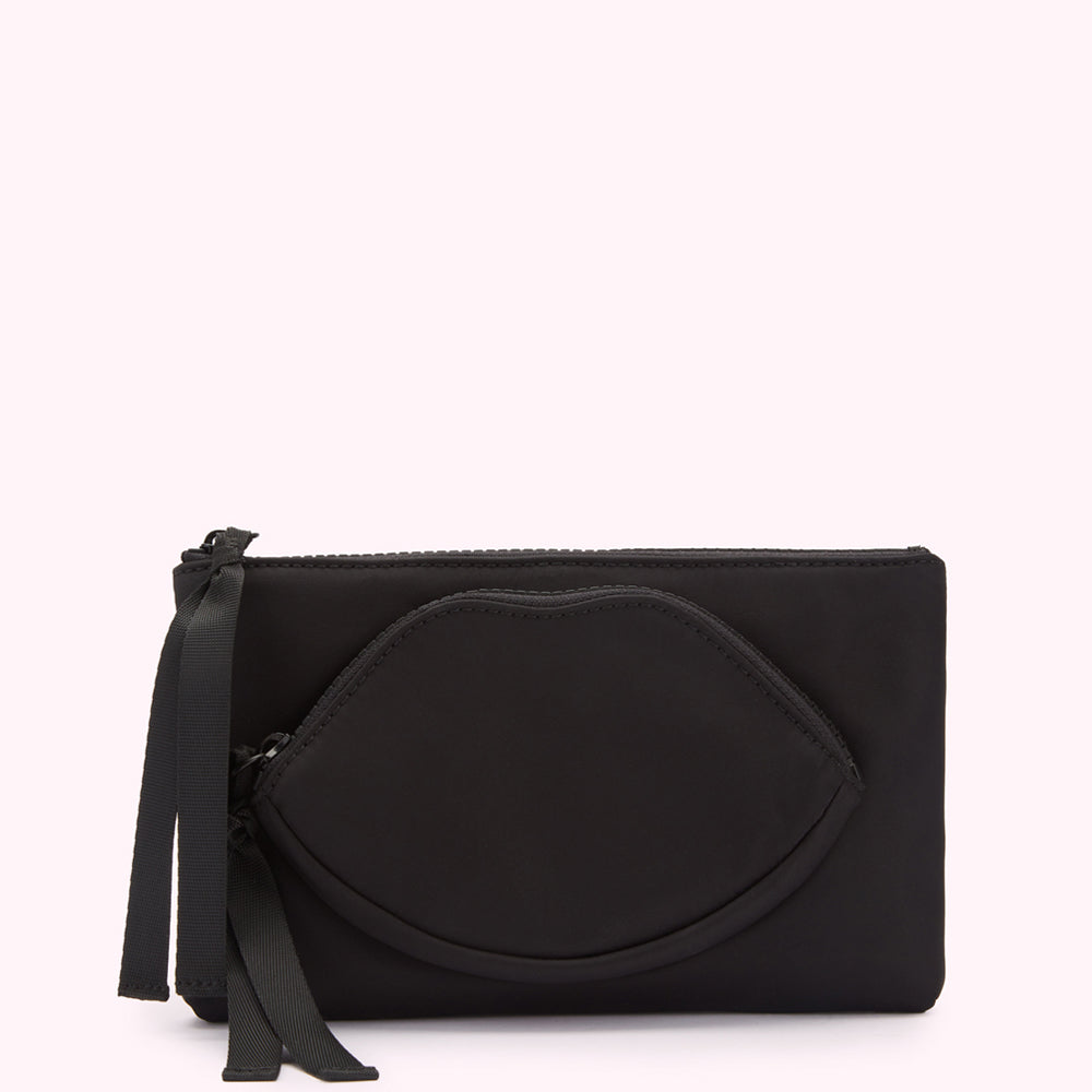 Black clutch with a lip-shaped zipper pull.