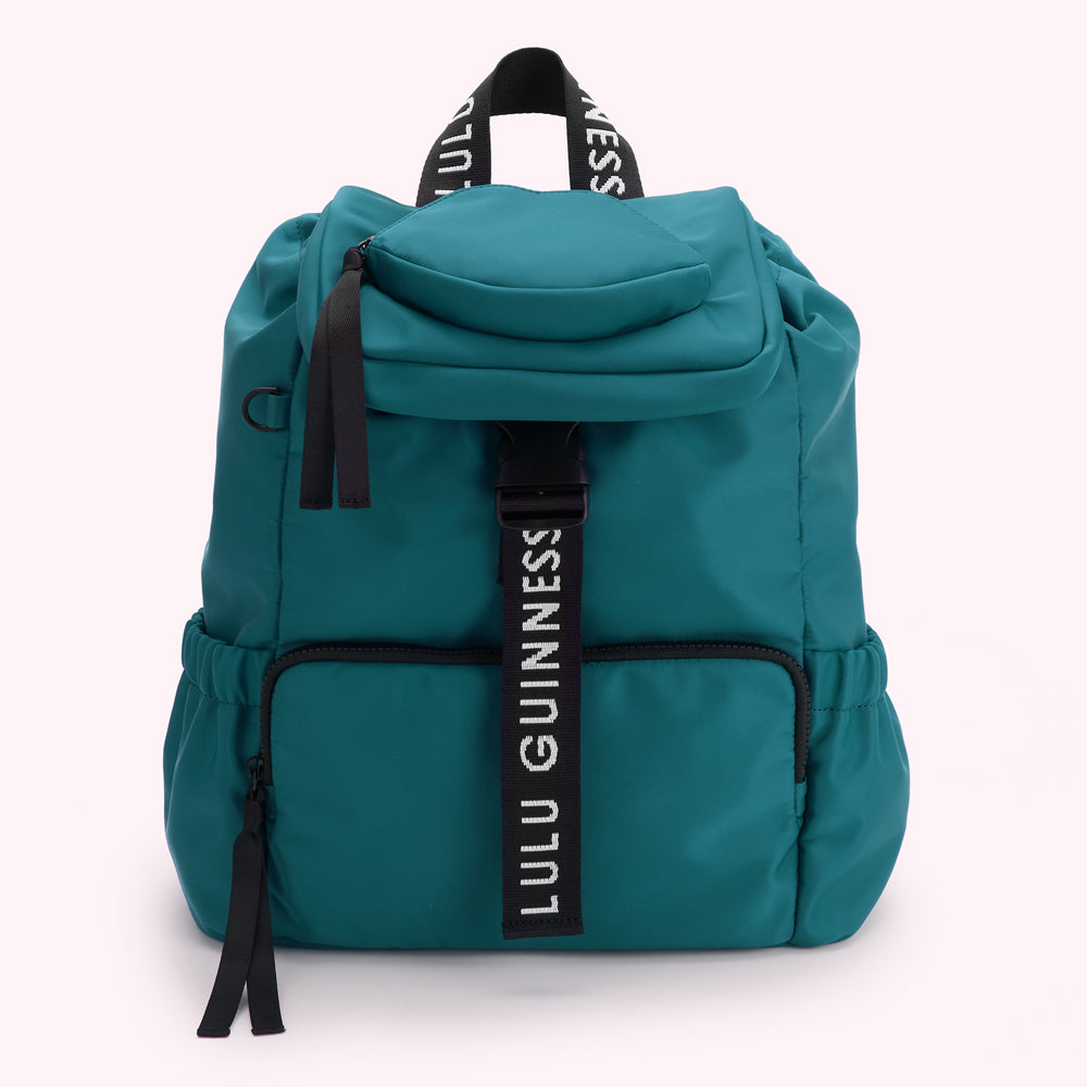 Teal Lulu Guinness backpack with black straps and accents.