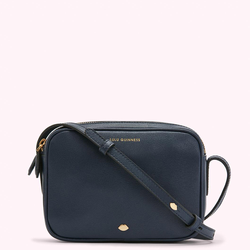 Navy blue Lulu Guinness crossbody bag with gold hardware.