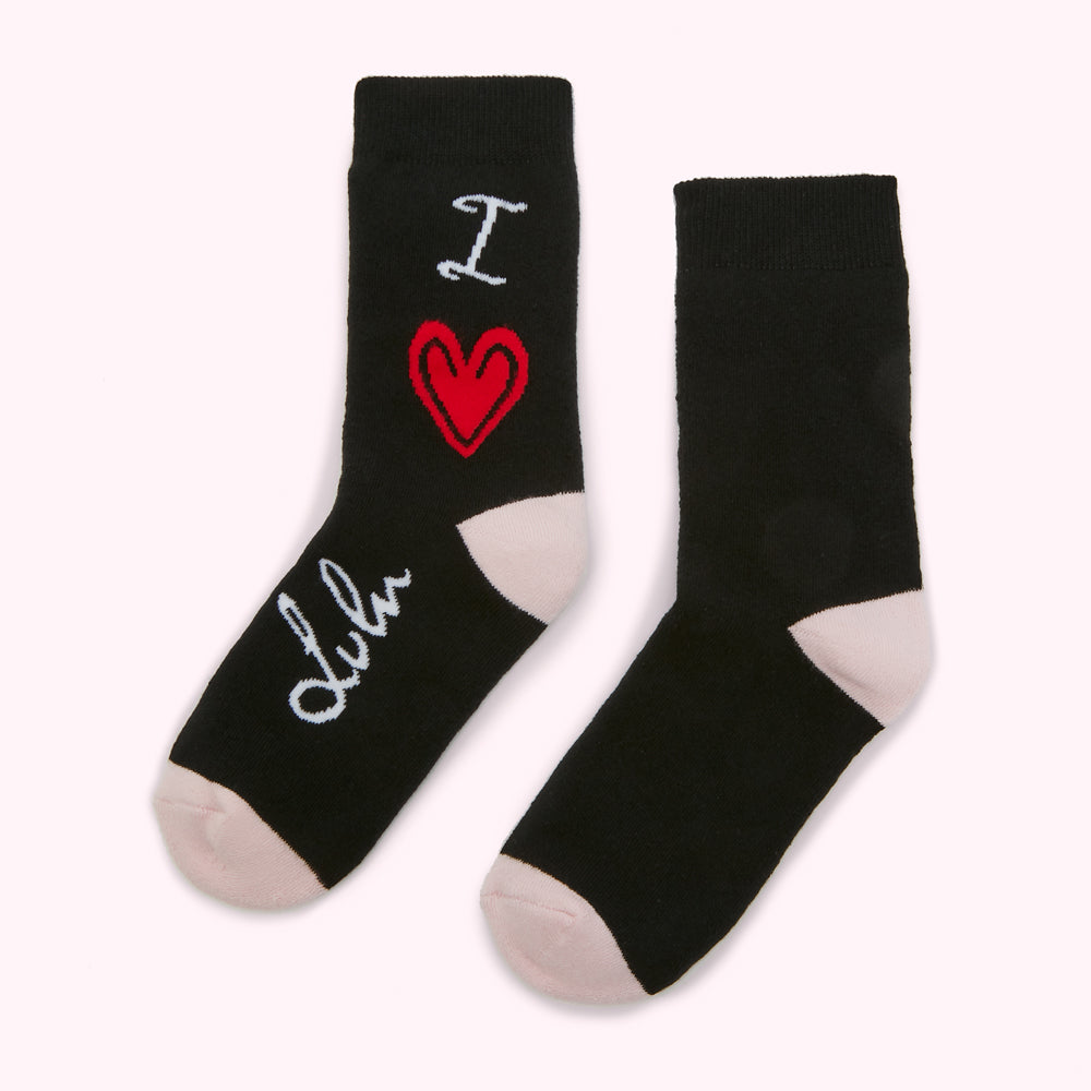 Pair of black ankle socks with a pink heel and toe, featuring a red heart and the text "I love Dub" in a stylized font.
